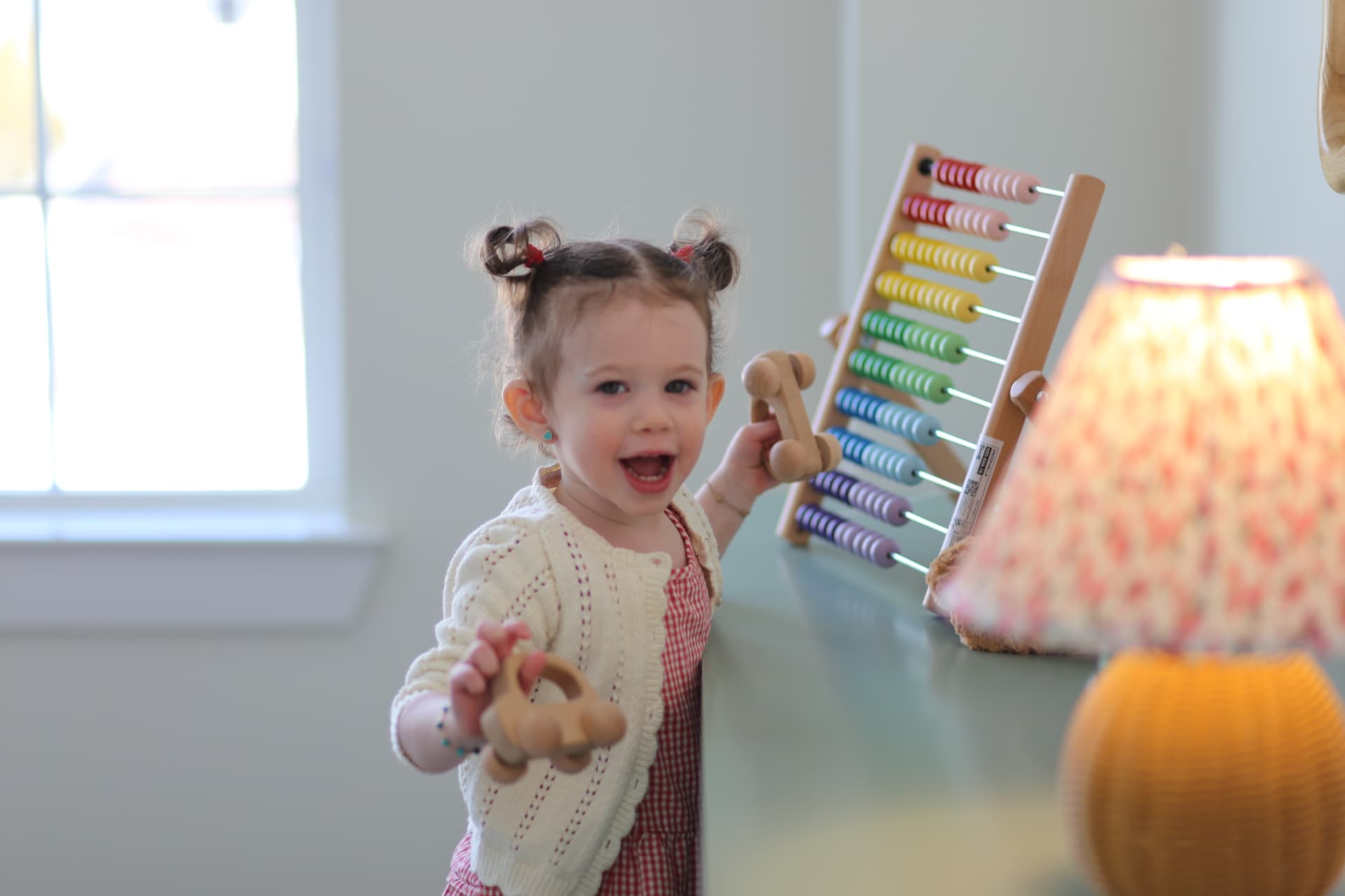 A big laugh beside the abacus by the window.