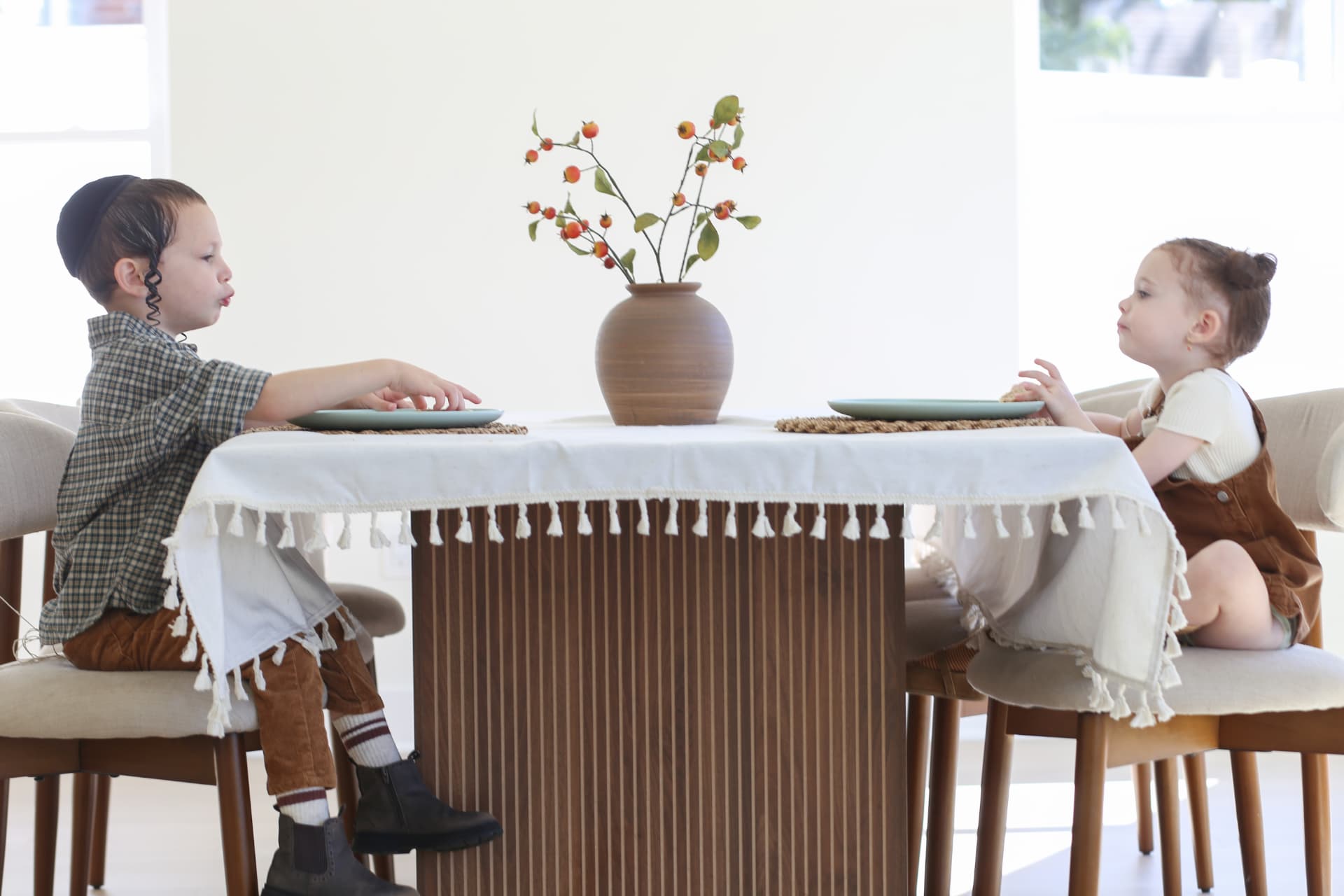 Settling in at either end of the table.