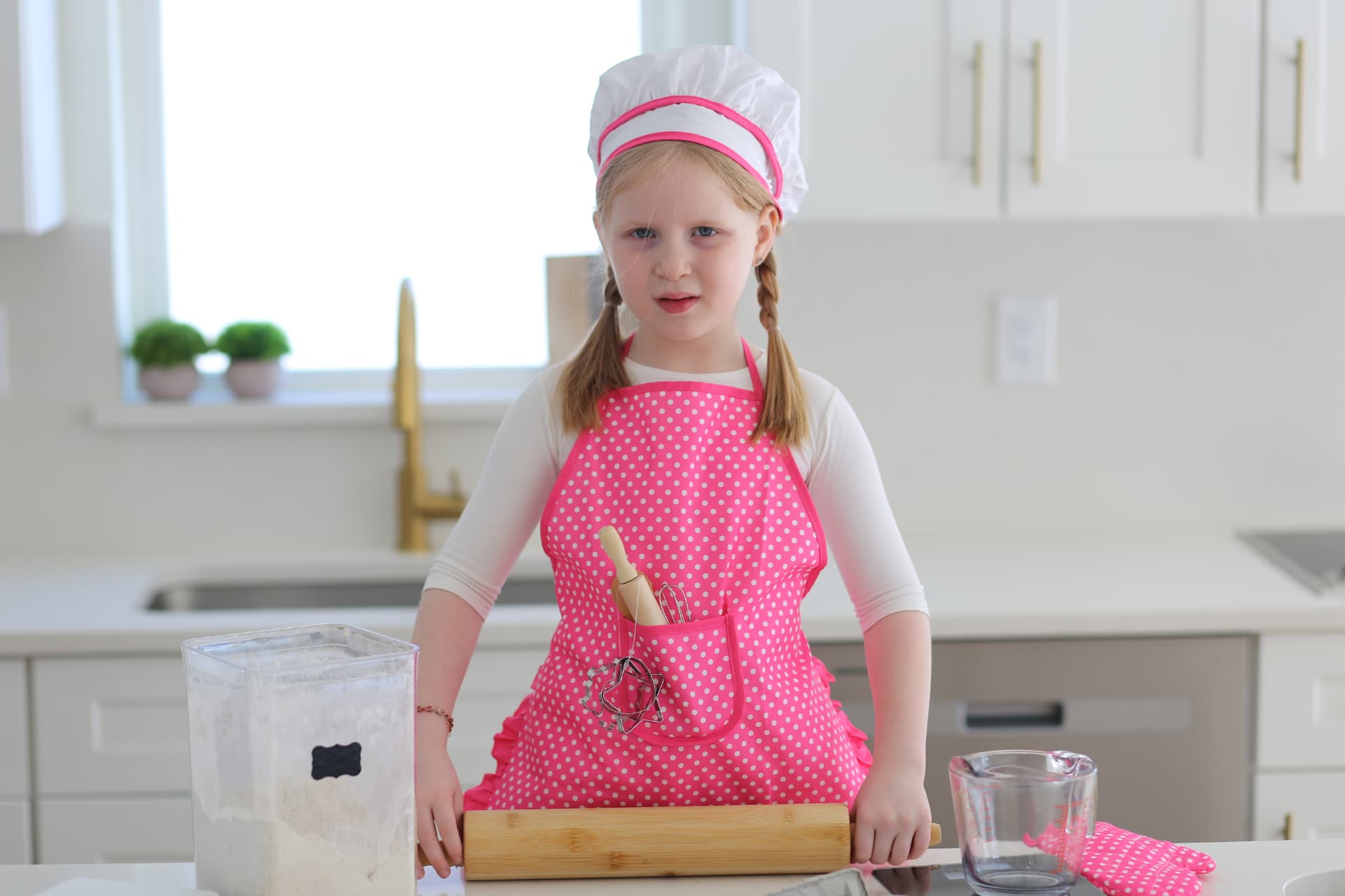 Rolling pin ready, chef hat and all.