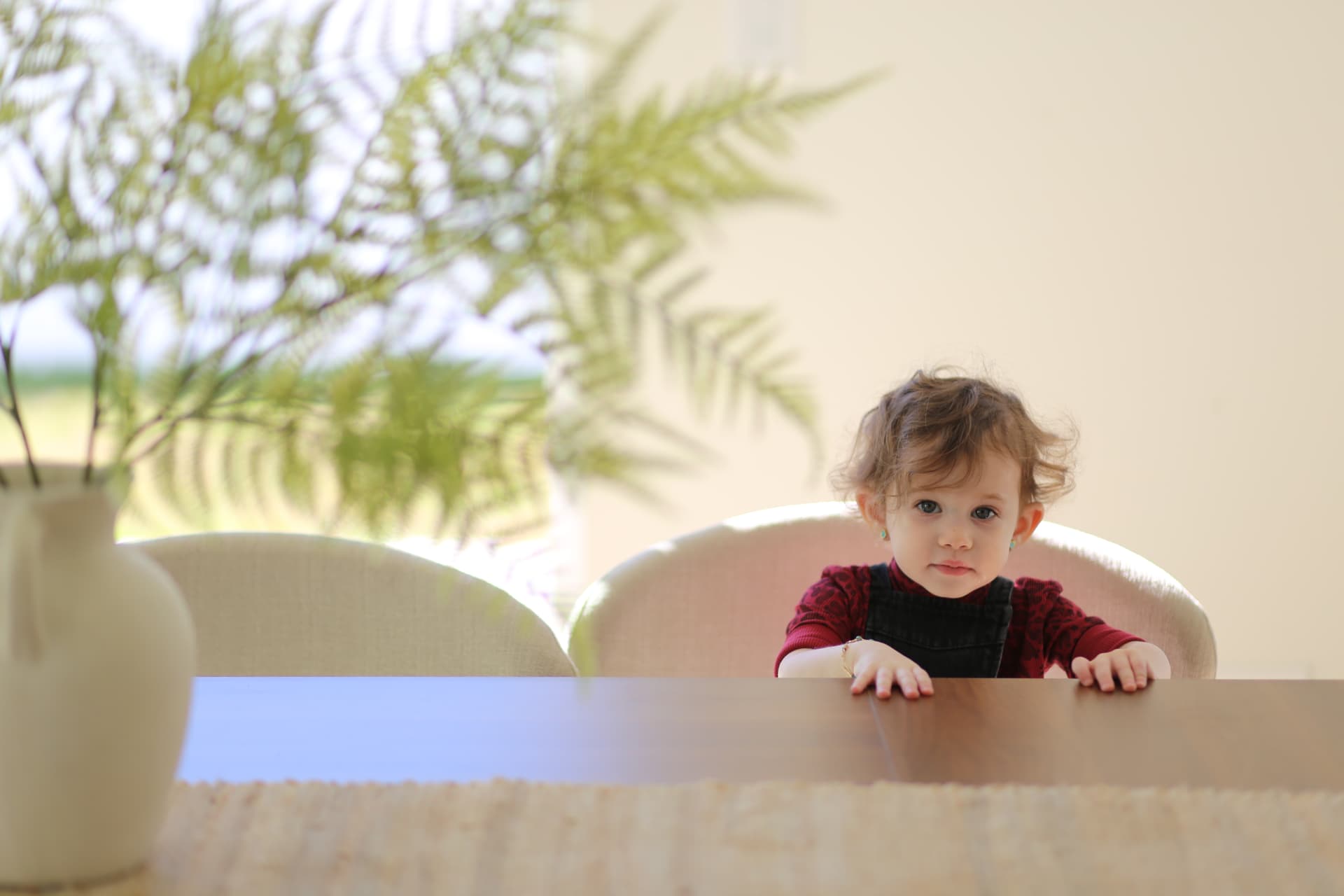 Hands on the table, ready for whatever comes next.